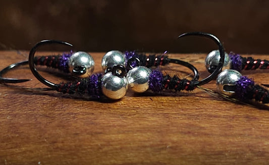 Purple and black holographic bug